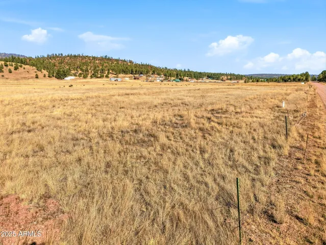 a view of an ocean and a mountain