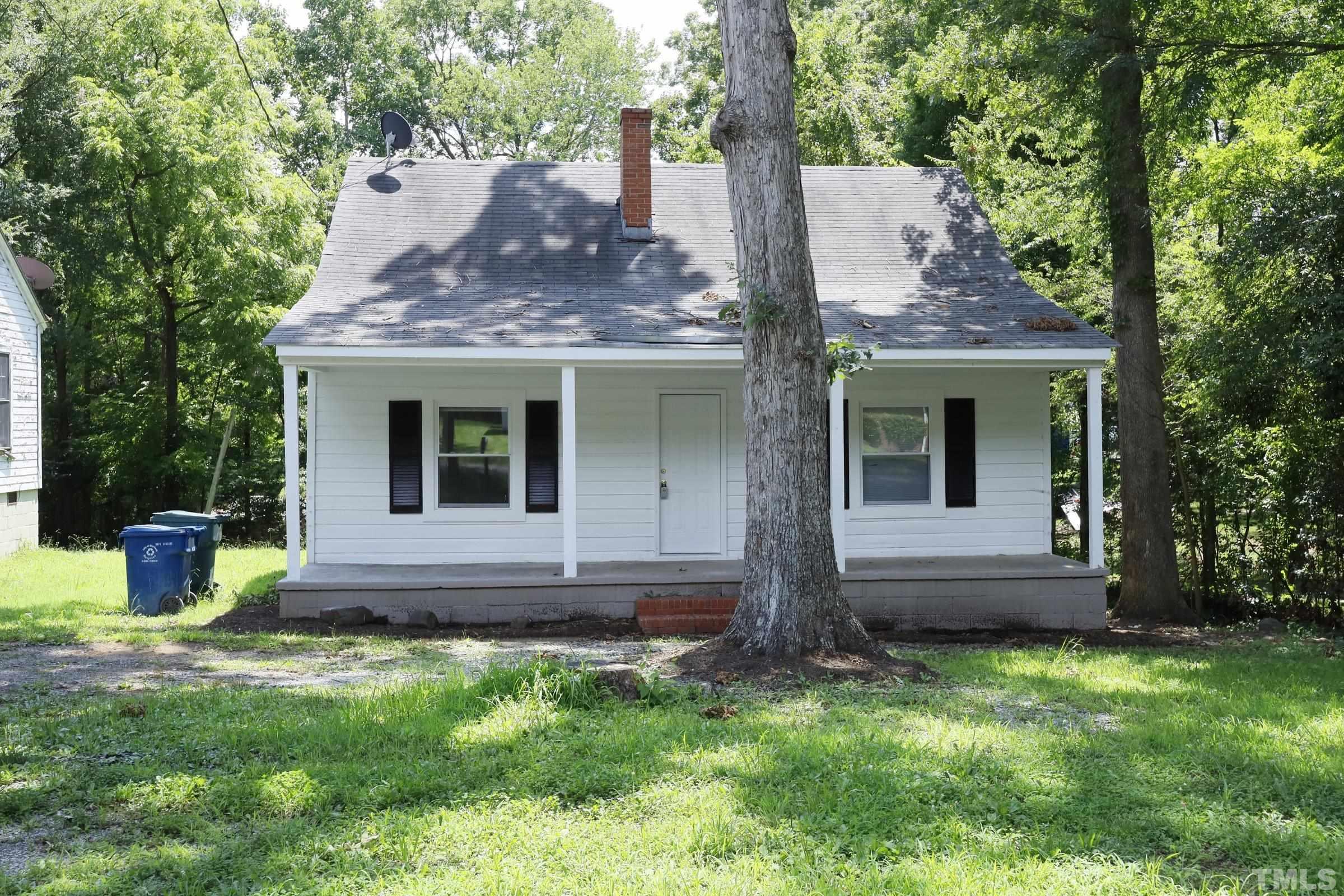 2522 Rochelle Street Durham, NC 27703 - Photo 1 of 28 a view of house with backyard and garden
