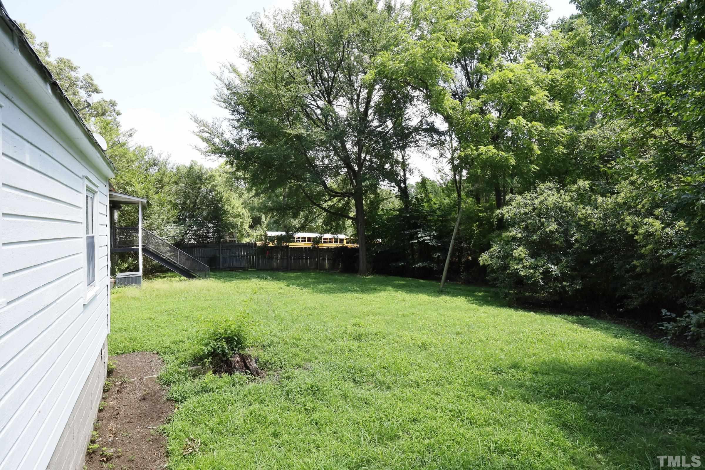 2522 Rochelle Street Durham, NC 27703 - Photo 27 of 28 a view of a backyard with a garden