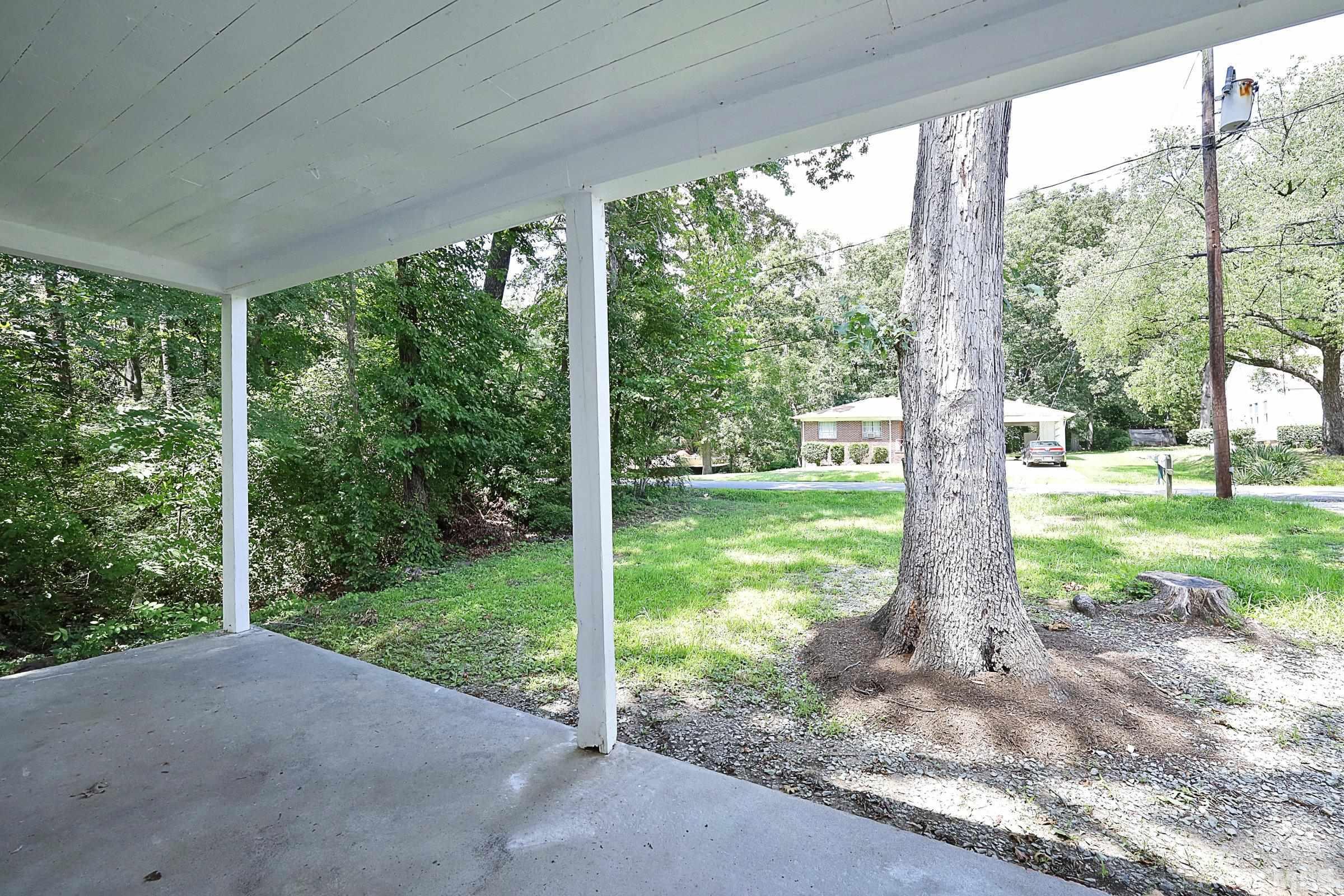 2522 Rochelle Street Durham, NC 27703 - Photo 5 of 28 a view of a house with a yard and tree