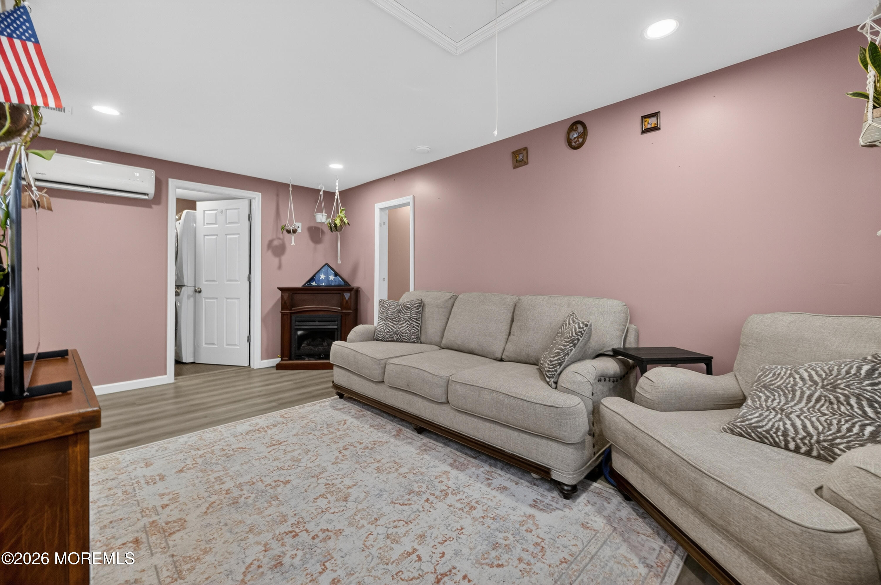 21 Anderson Street Union Beach, NJ 07735 - Photo 23 of 40 a living room with furniture and a flat screen tv