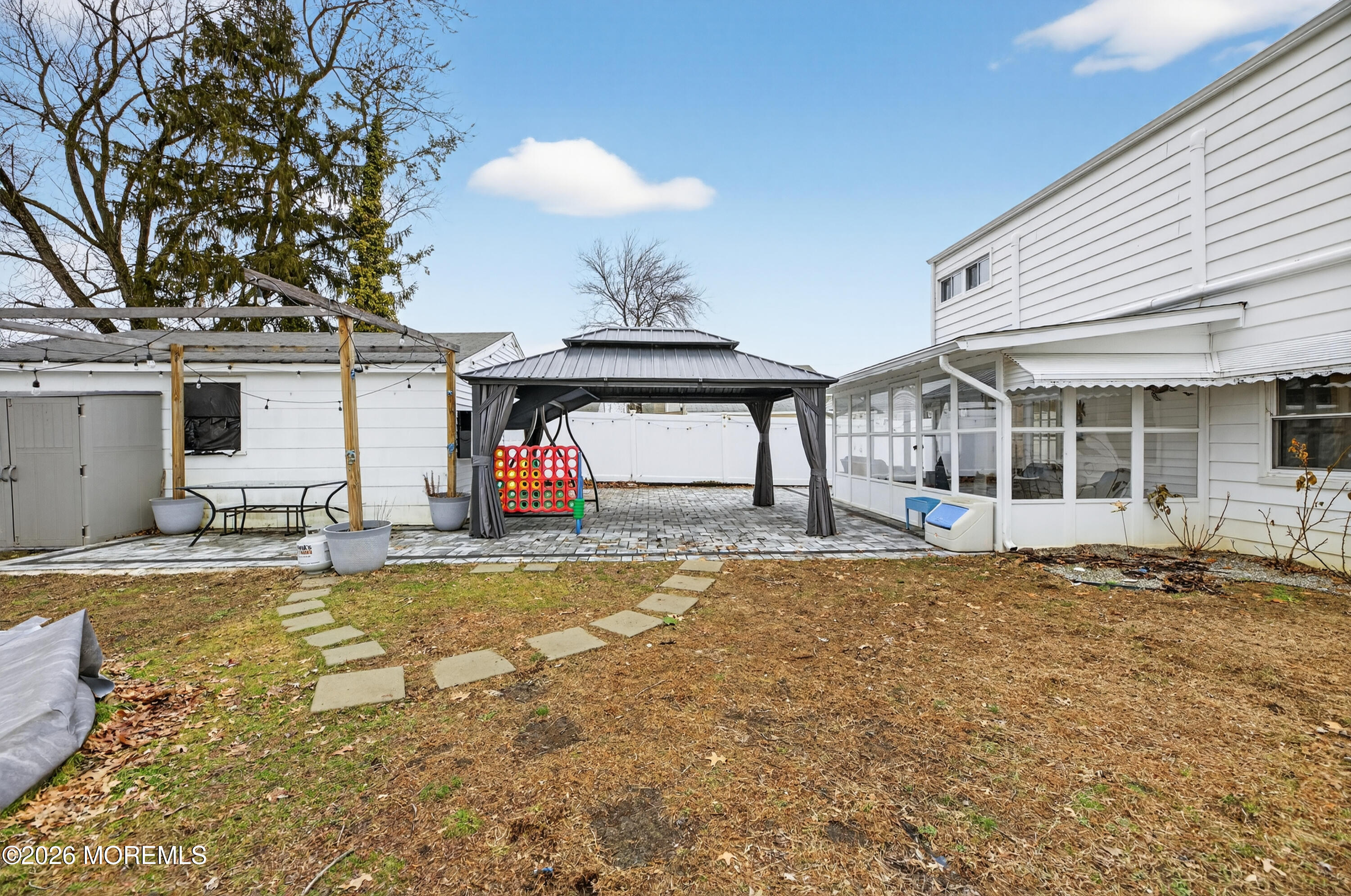 21 Anderson Street Union Beach, NJ 07735 - Photo 25 of 40 a view of a house with backyard and sitting area