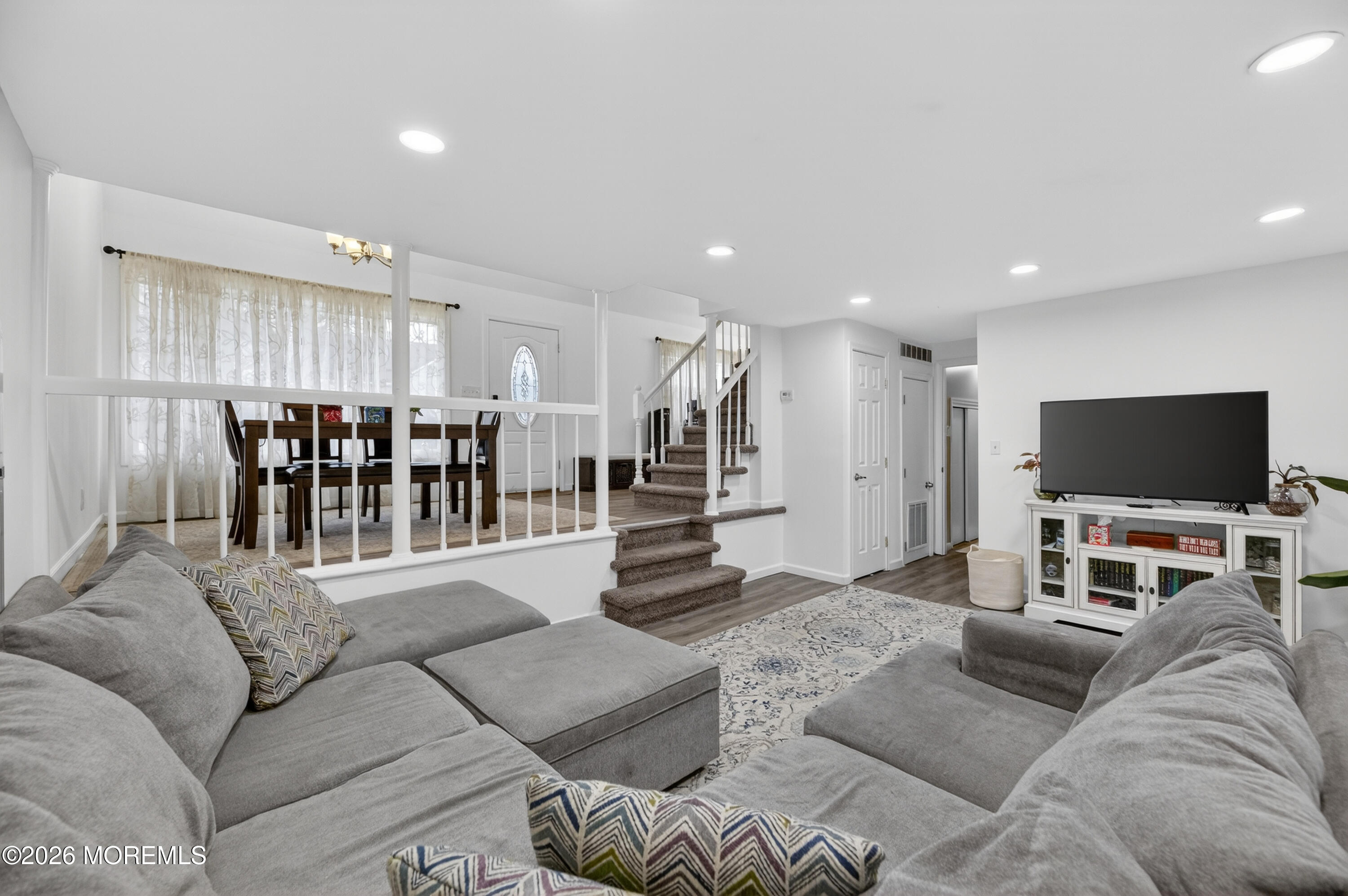 21 Anderson Street Union Beach, NJ 07735 - Photo 10 of 40 a living room with furniture and a flat screen tv