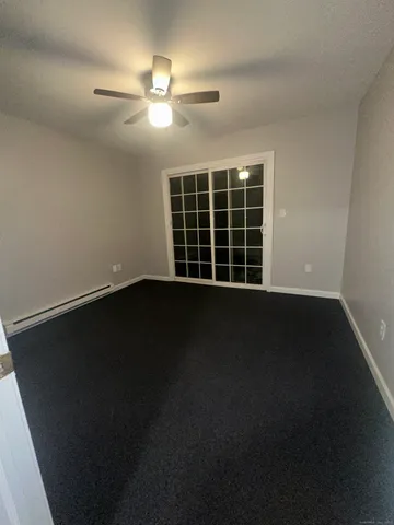 a view of wooden floor in an empty room