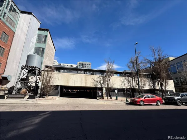 a car parked in front of a building
