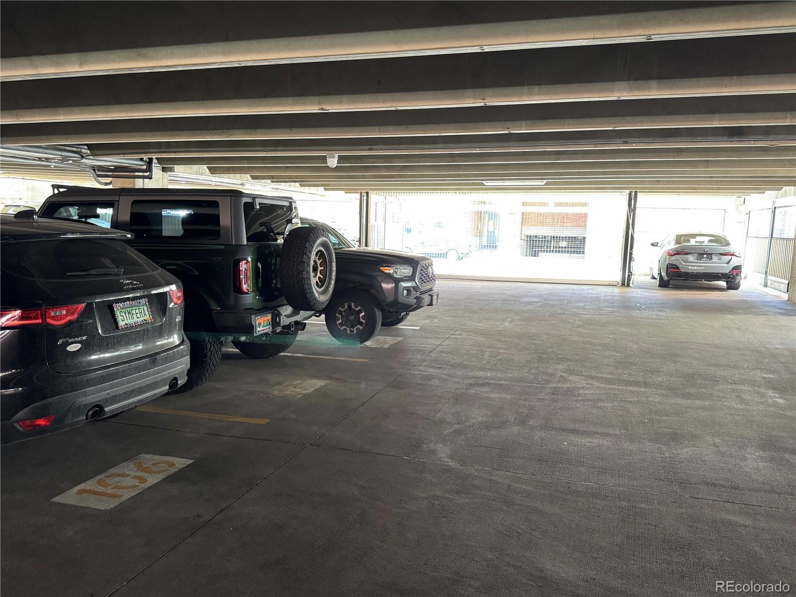 2960 Inca Street Denver, CO 80202 - Photo 6 of 10 a view of car parking