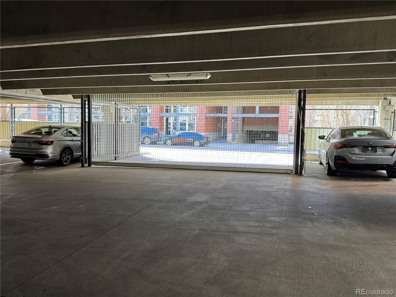 2960 Inca Street Denver, CO 80202 - Photo 8 of 10 a view of car parking