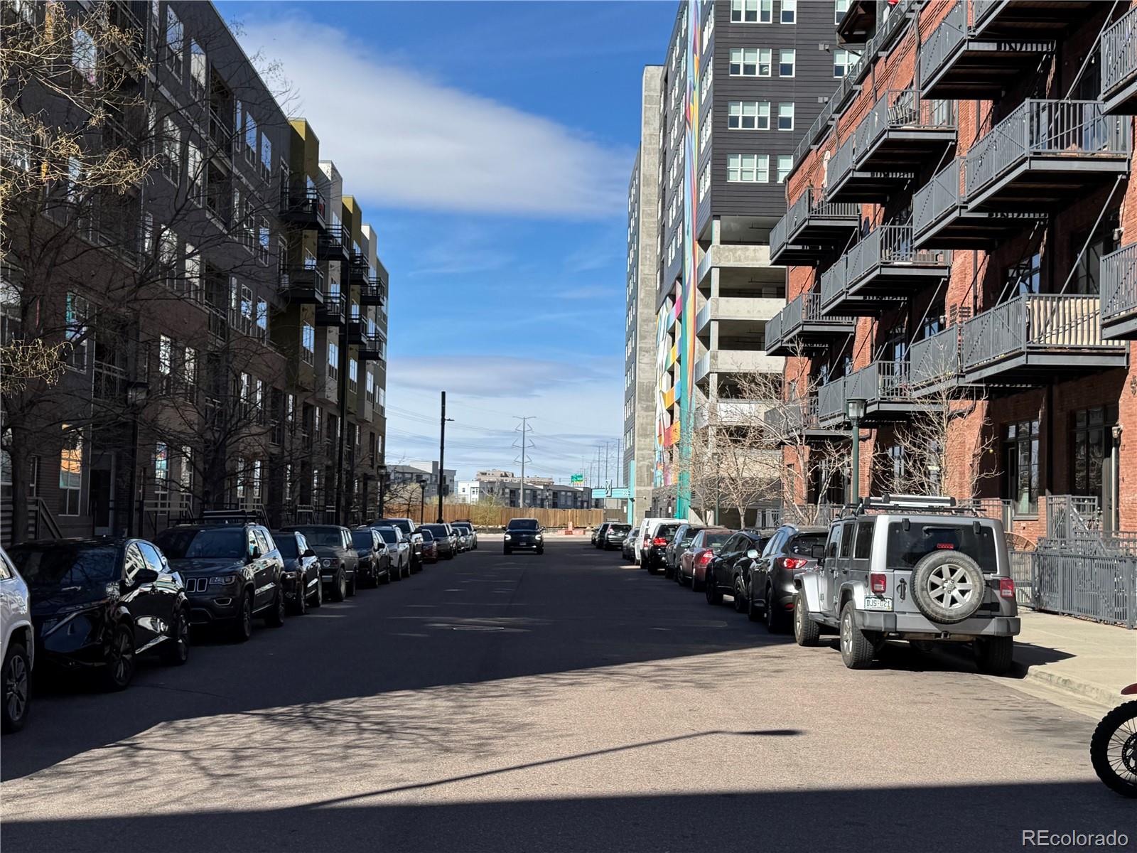 2960 Inca Street Denver, CO 80202 - Photo 10 of 10 a city street with cars parked in front of it