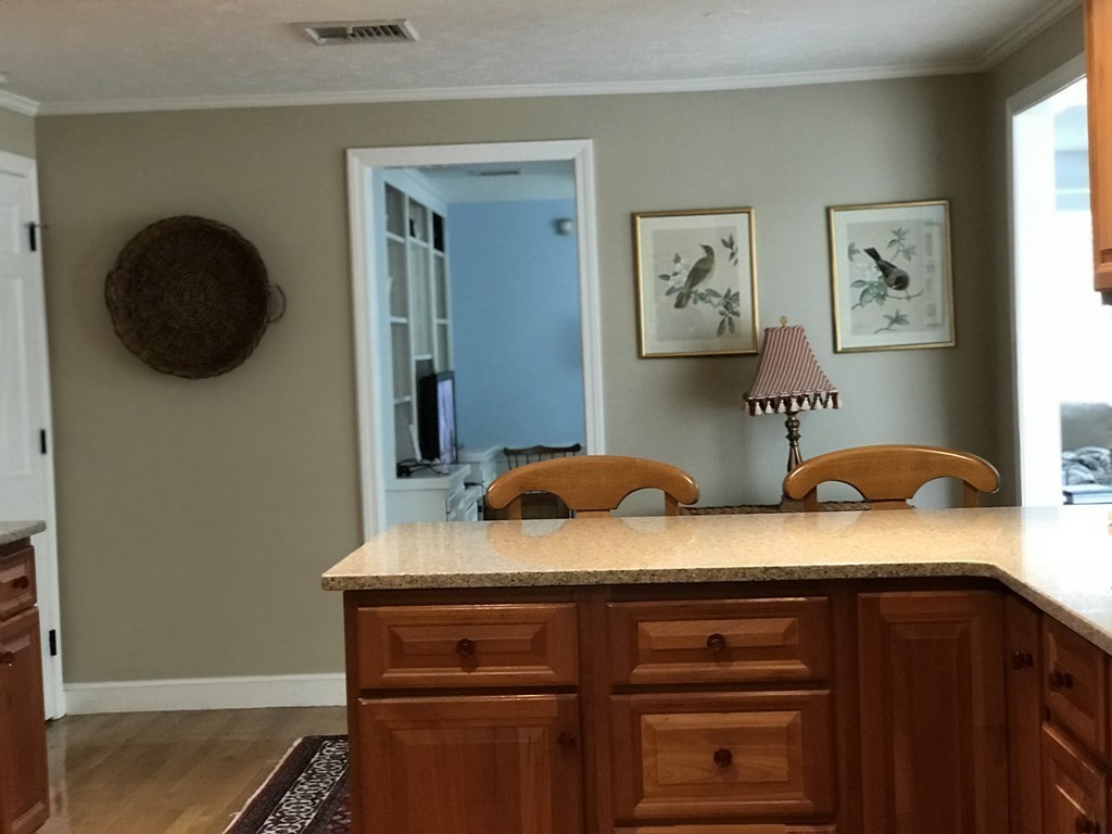 43 Mayflower Circle Hanover, MA 02339 - Photo 11 of 24 a bedroom with a bed and painting on the wall