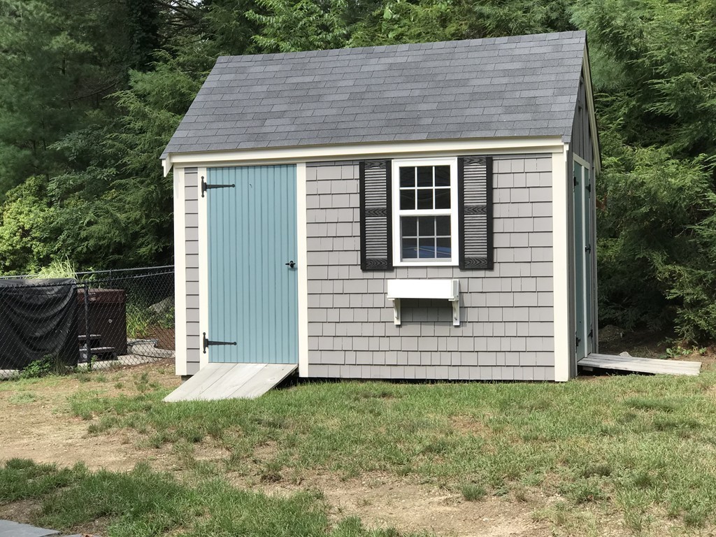 43 Mayflower Circle Hanover, MA 02339 - Photo 22 of 24 a view of house with backyard