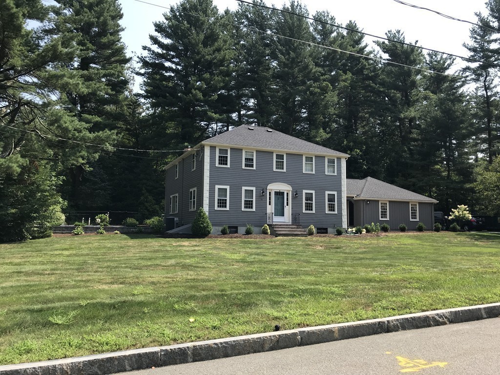 43 Mayflower Circle Hanover, MA 02339 - Photo 24 of 24 a view of a house with a big yard