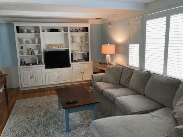 43 Mayflower Circle Hanover, MA 02339 - Photo 3 of 24 a living room with furniture and a flat screen tv