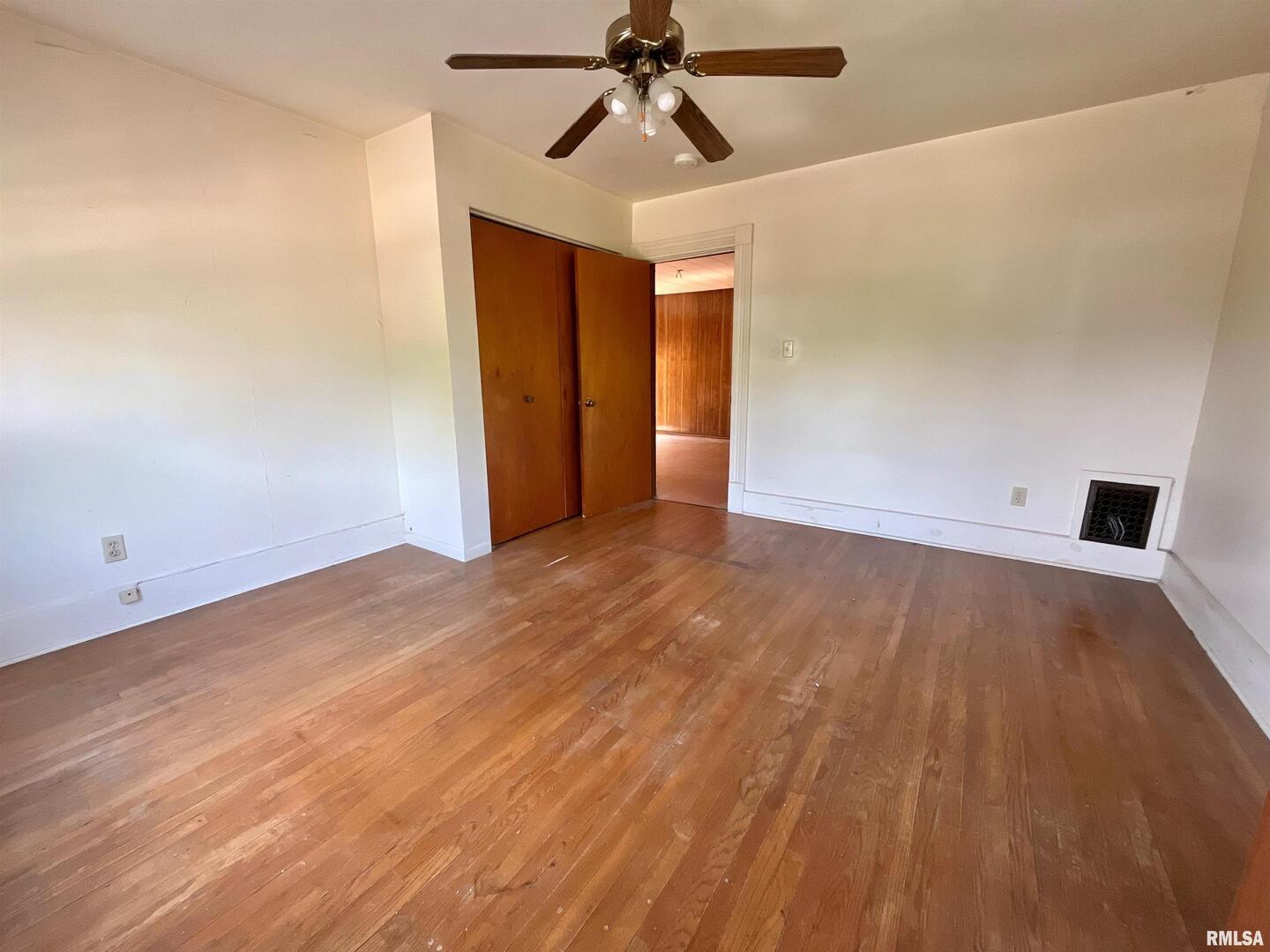 633 4th Avenue South Clinton, IA 52732 - Photo 24 of 34 a view of empty room with wooden floor