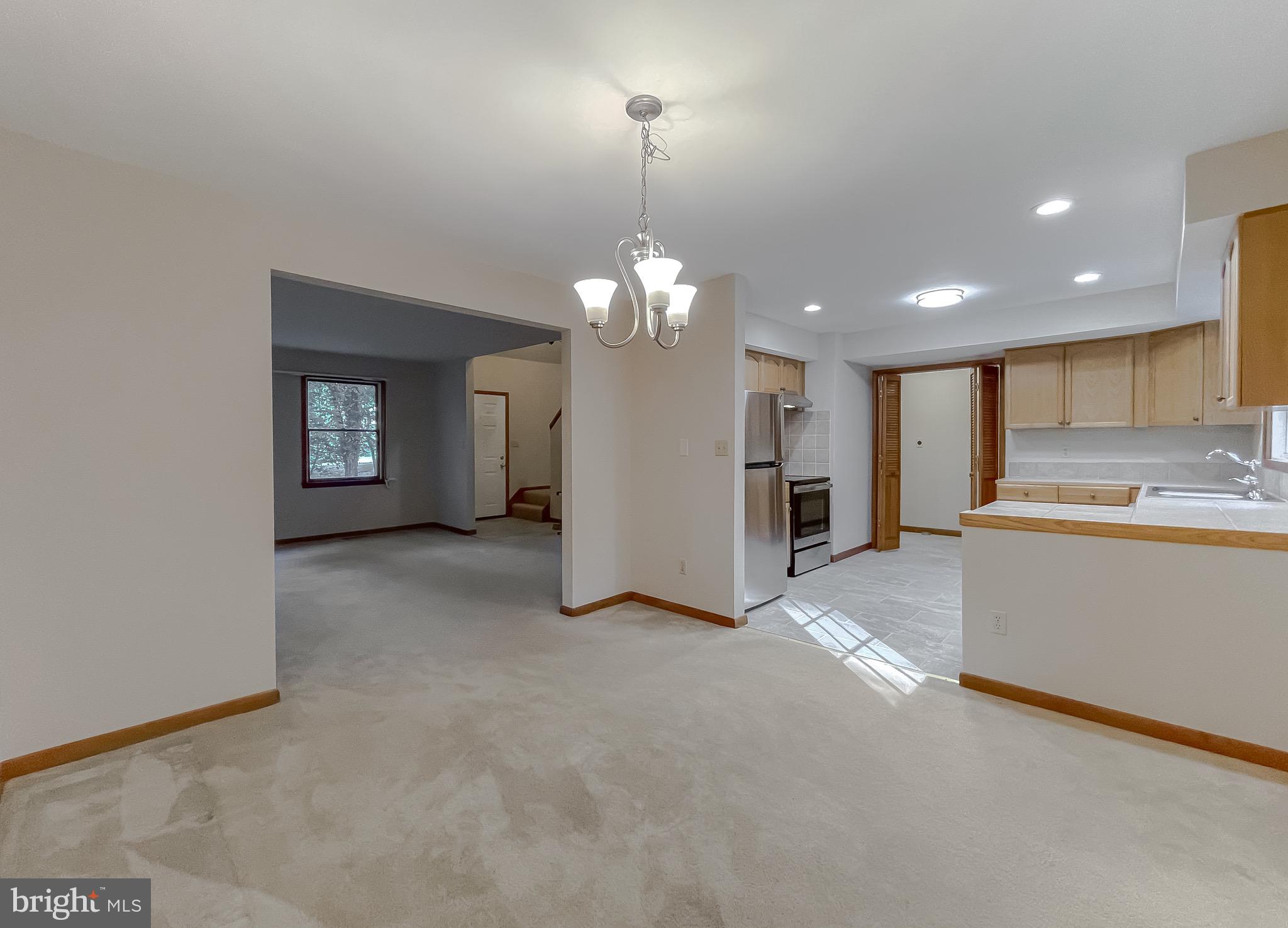 14814 Point Lookout Road St. Inigoes, MD 20684 - Photo 14 of 59 Dining area to kitchen and family room