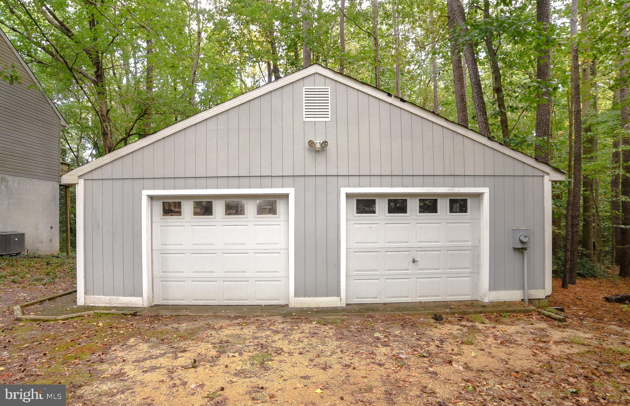 14814 Point Lookout Road St. Inigoes, MD 20684 - Photo 2 of 59 Detached two car garage with tons of storage!