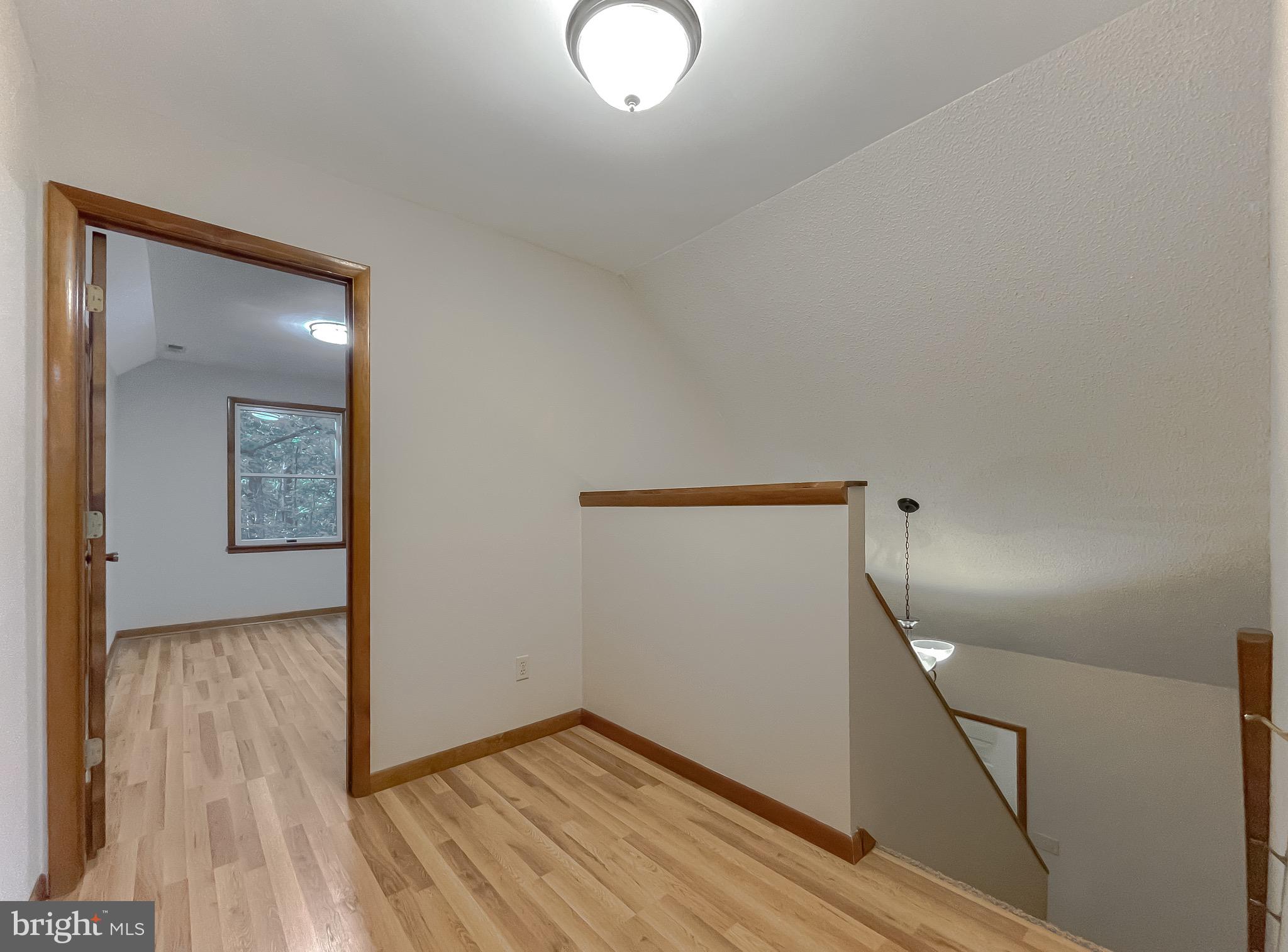14814 Point Lookout Road St. Inigoes, MD 20684 - Photo 40 of 59 Open upstairs foyer