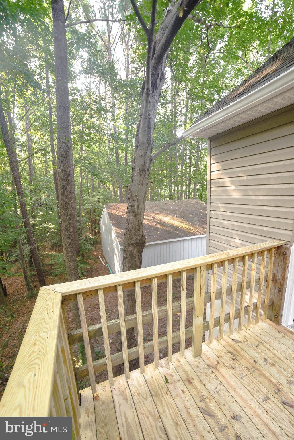 14814 Point Lookout Road St. Inigoes, MD 20684 - Photo 49 of 59 View of garage from deck
