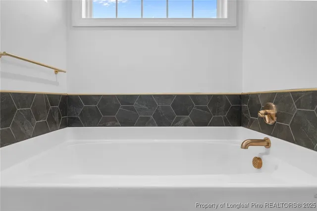 a bathroom with a bathtub