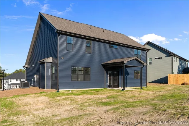 a house view with a backyard space