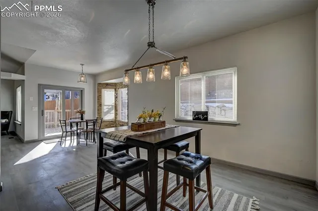 a table and chairs in a room