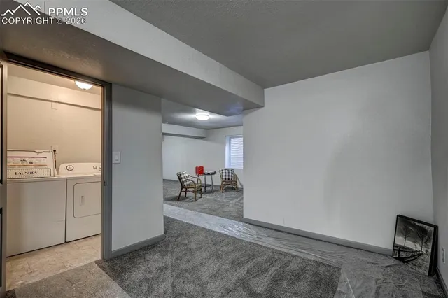 a view of livingroom with furniture and hardwood floor