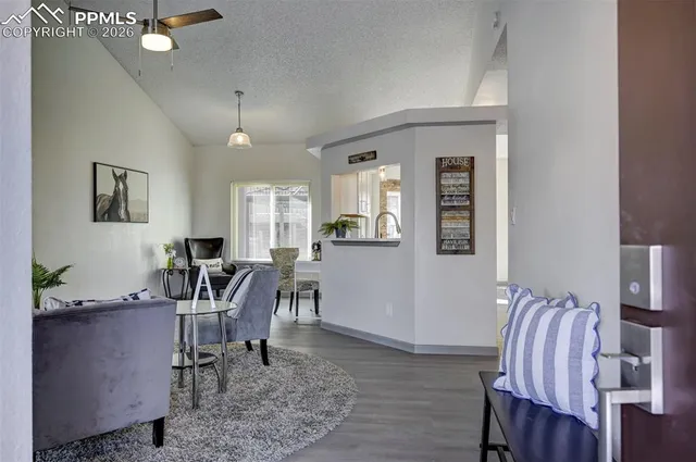 a workspace with furniture and window