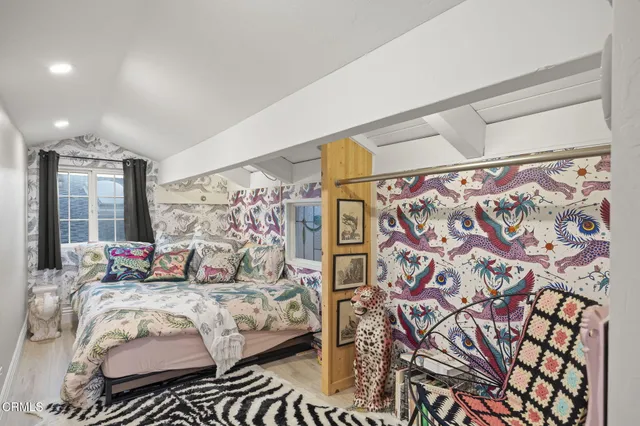 a bathroom with a tub sink and shower