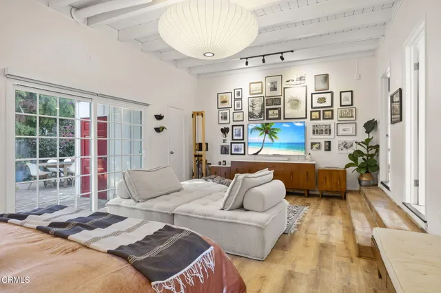 a bed room with a bed and a couch