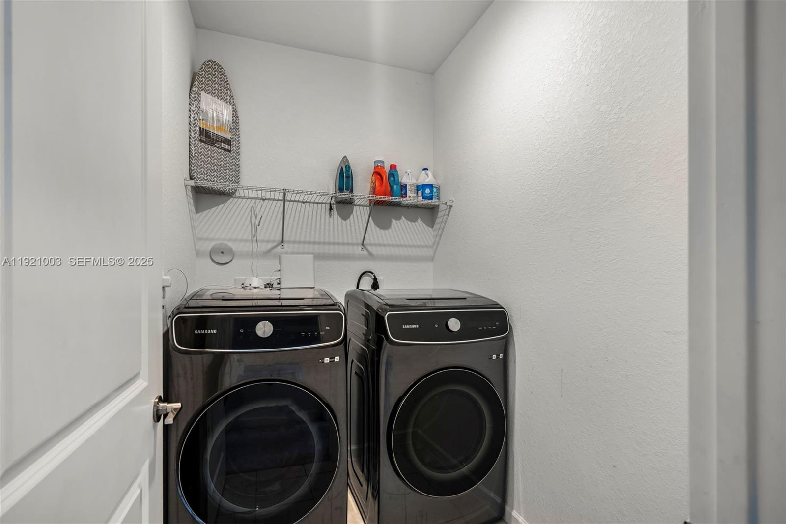 21189 Southwest 127th Court Miami, FL 33177 - Photo 27 of 46 a utility room with dryer and washer