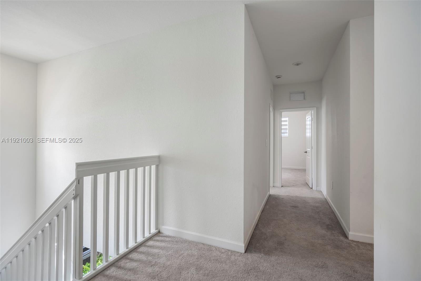 21189 Southwest 127th Court Miami, FL 33177 - Photo 28 of 46 a view of a hallway