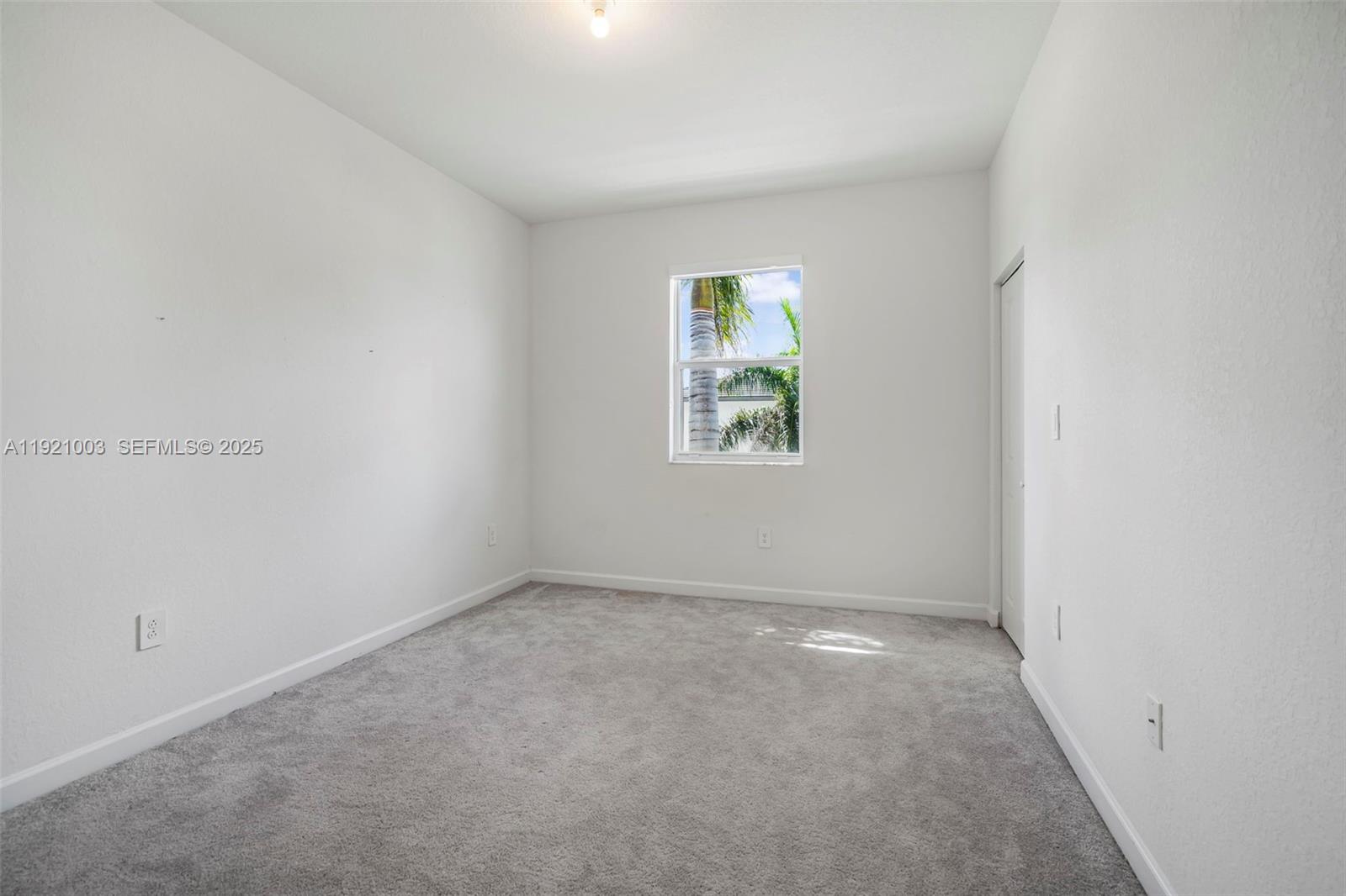 21189 Southwest 127th Court Miami, FL 33177 - Photo 34 of 46 an empty room with windows