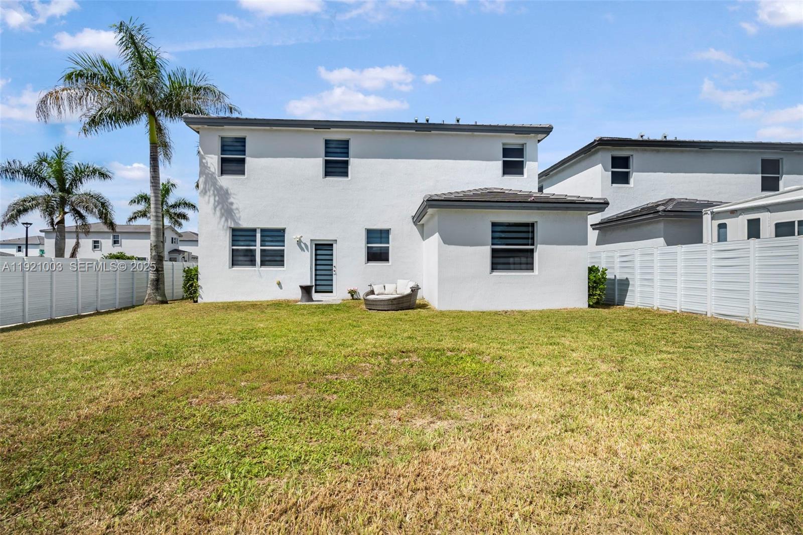 21189 Southwest 127th Court Miami, FL 33177 - Photo 38 of 46 a view of a house with a backyard