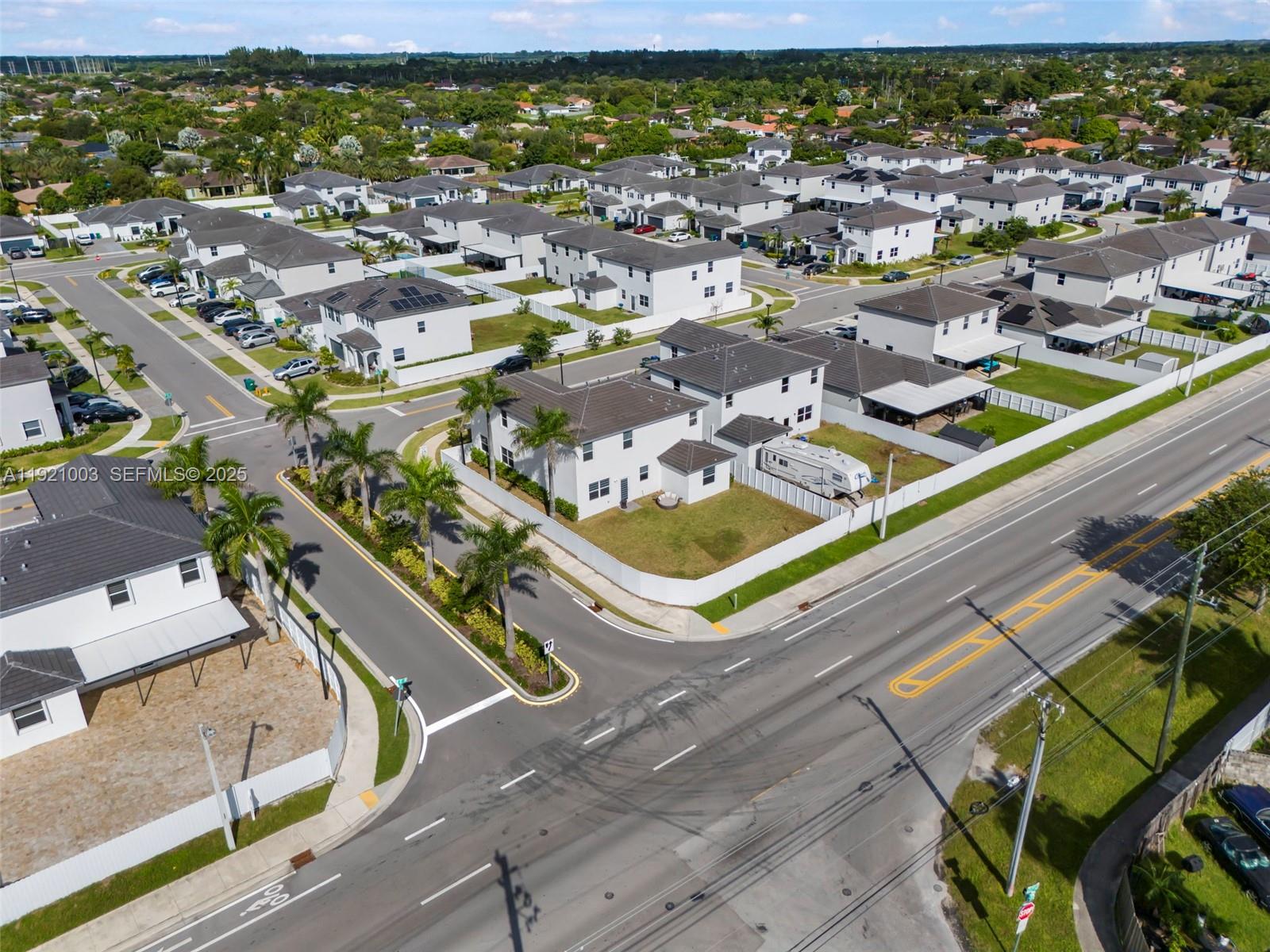21189 Southwest 127th Court Miami, FL 33177 - Photo 45 of 46 an aerial view of residential houses with outdoor space