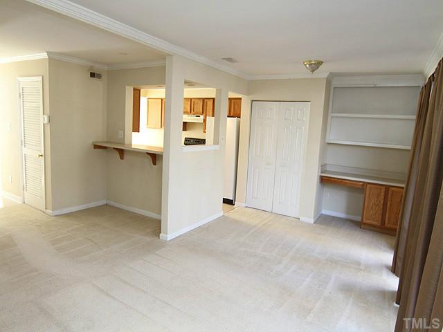 1778 Quail Ridge Road Raleigh, NC 27609 - Photo 5 of 14 a view of an empty room with a closet
