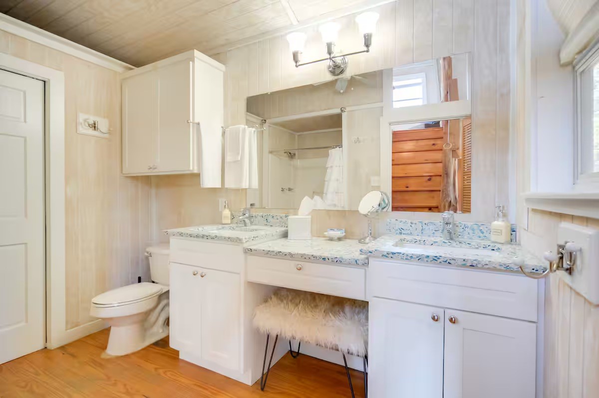 17 September Ridge Johnson City, TX 78636 - Photo 15 of 40 Bathroom with toilet, wood finished floors, curtained shower, wooden ceiling, and vanity
