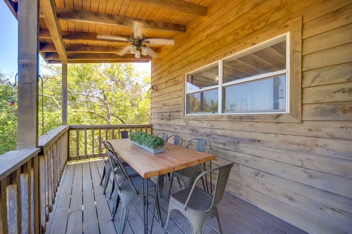 17 September Ridge Johnson City, TX 78636 - Photo 16 of 40 Wooden deck with outdoor dining space and a ceiling fan