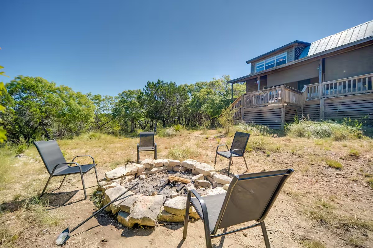 17 September Ridge Johnson City, TX 78636 - Photo 20 of 40 View of yard with a fire pit, a wooden deck, and stairway
