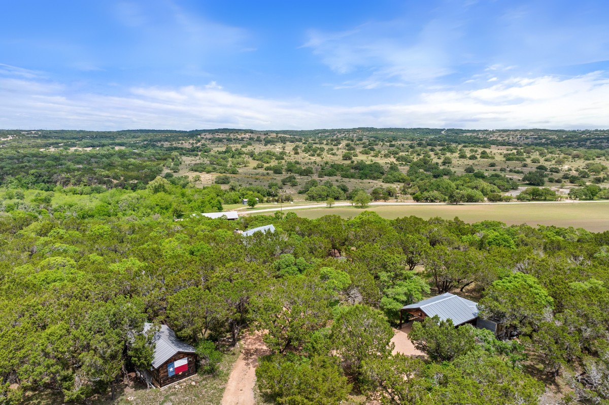 17 September Ridge Johnson City, TX 78636 - Photo 38 of 40 Aerial overview of property's location featuring a forest