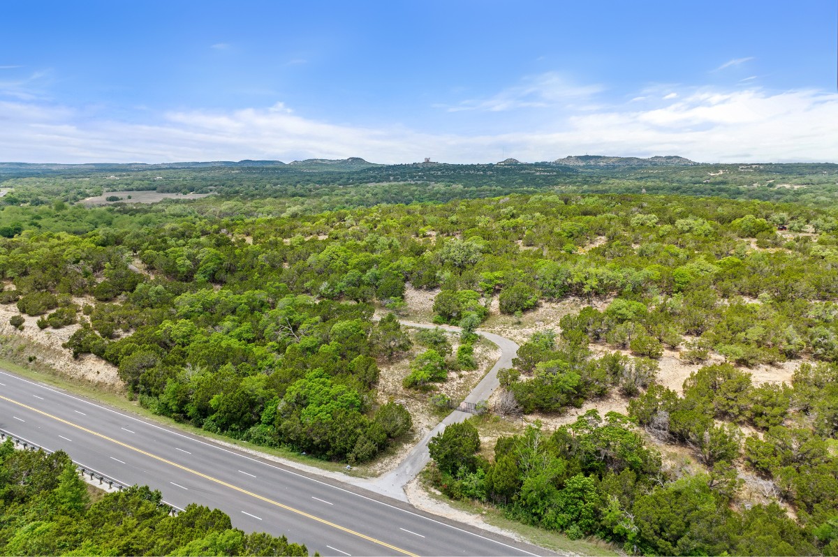 17 September Ridge Johnson City, TX 78636 - Photo 39 of 40 Drone / aerial view of a forest and a mountain backdrop
