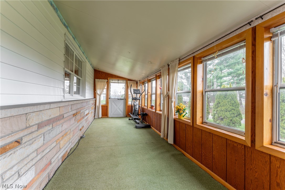 4833 Angling Road Wooster, OH 44691 - Photo 20 of 49 Unfurnished sunroom with lofted ceiling