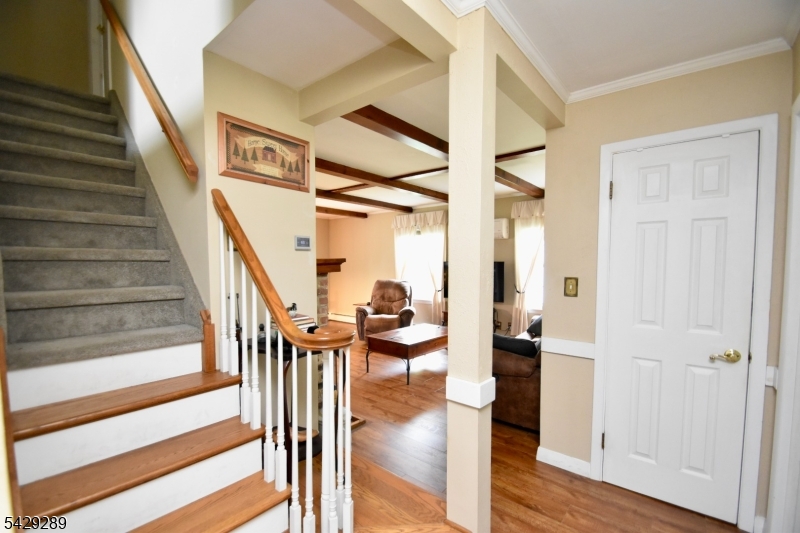 16 Pequot Trail Oak Ridge, NJ 07438 - Photo 12 of 18 a view of entryway and hall with wooden floor