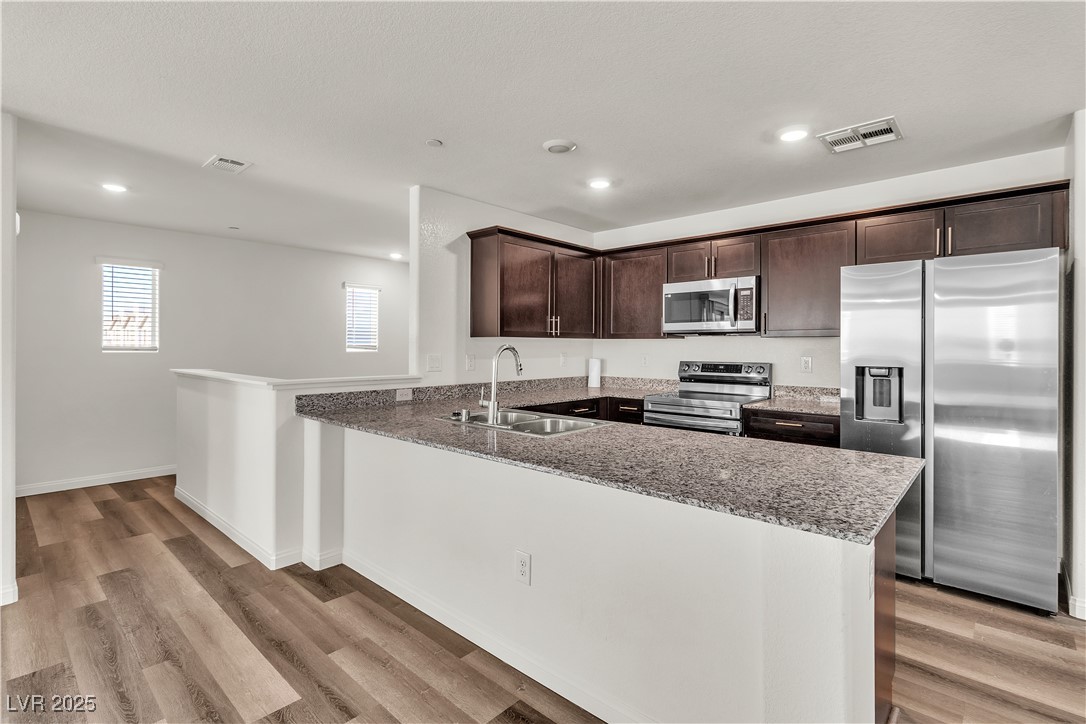 6952 Crescent Gold Street North Las Vegas, NV 89086 - Photo 13 of 58 Kitchen featuring appliances with stainless steel