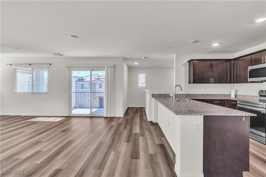 6952 Crescent Gold Street North Las Vegas, NV 89086 - Photo 15 of 58 Kitchen with appliances with stainless steel finis