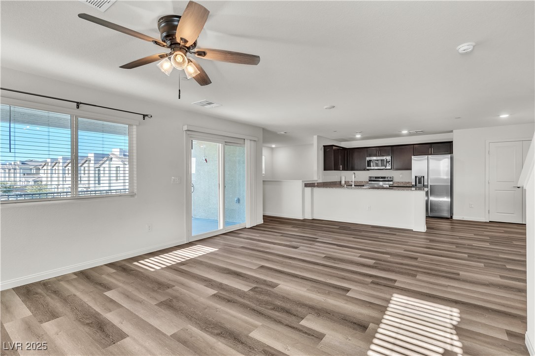 6952 Crescent Gold Street North Las Vegas, NV 89086 - Photo 19 of 58 Unfurnished living room with a ceiling fan, recess