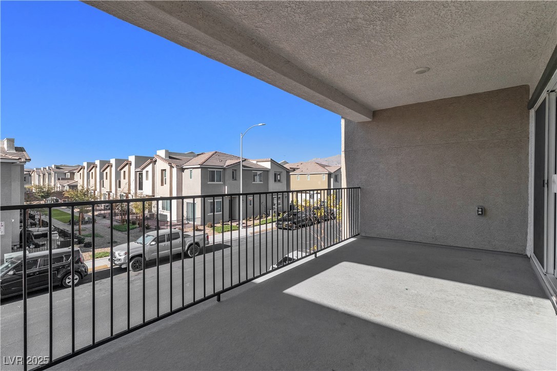 6952 Crescent Gold Street North Las Vegas, NV 89086 - Photo 21 of 58 Balcony with a residential view