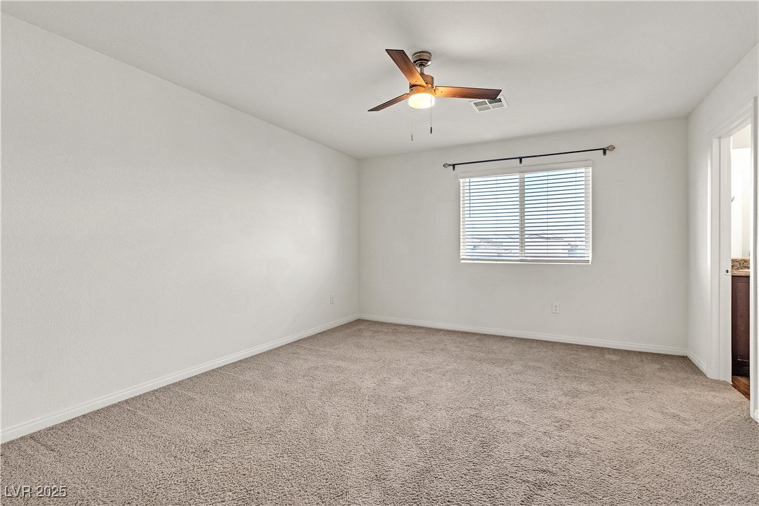 6952 Crescent Gold Street North Las Vegas, NV 89086 - Photo 29 of 58 Unfurnished room featuring a ceiling fan, light co