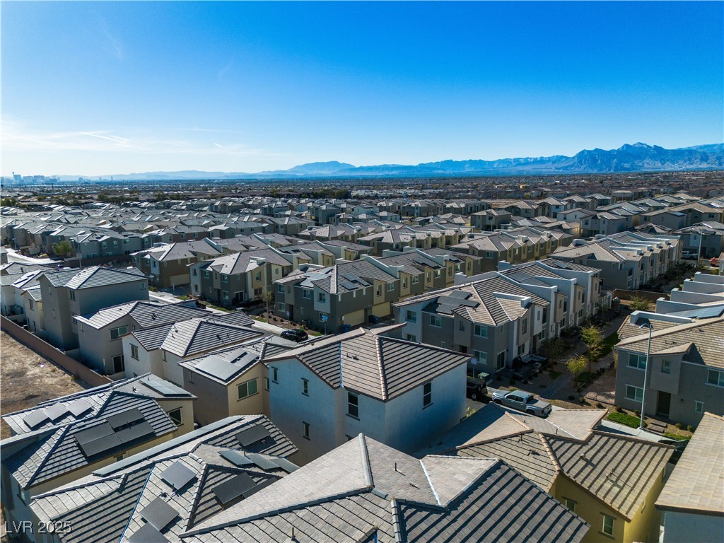 6952 Crescent Gold Street North Las Vegas, NV 89086 - Photo 43 of 58 Aerial perspective of suburban area with a mountai