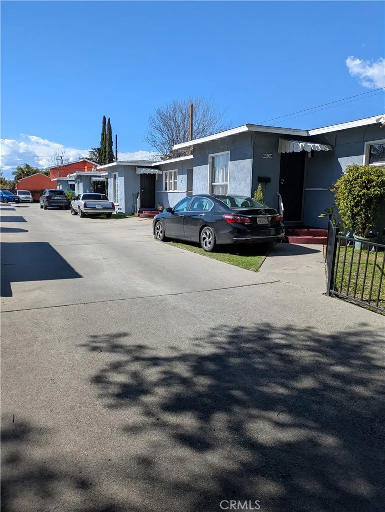 6809 Heliotrope Avenue Bell, CA 90201 - Photo 5 of 18 a front view of a house with a yard