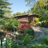 a backyard of a house with lots of green space