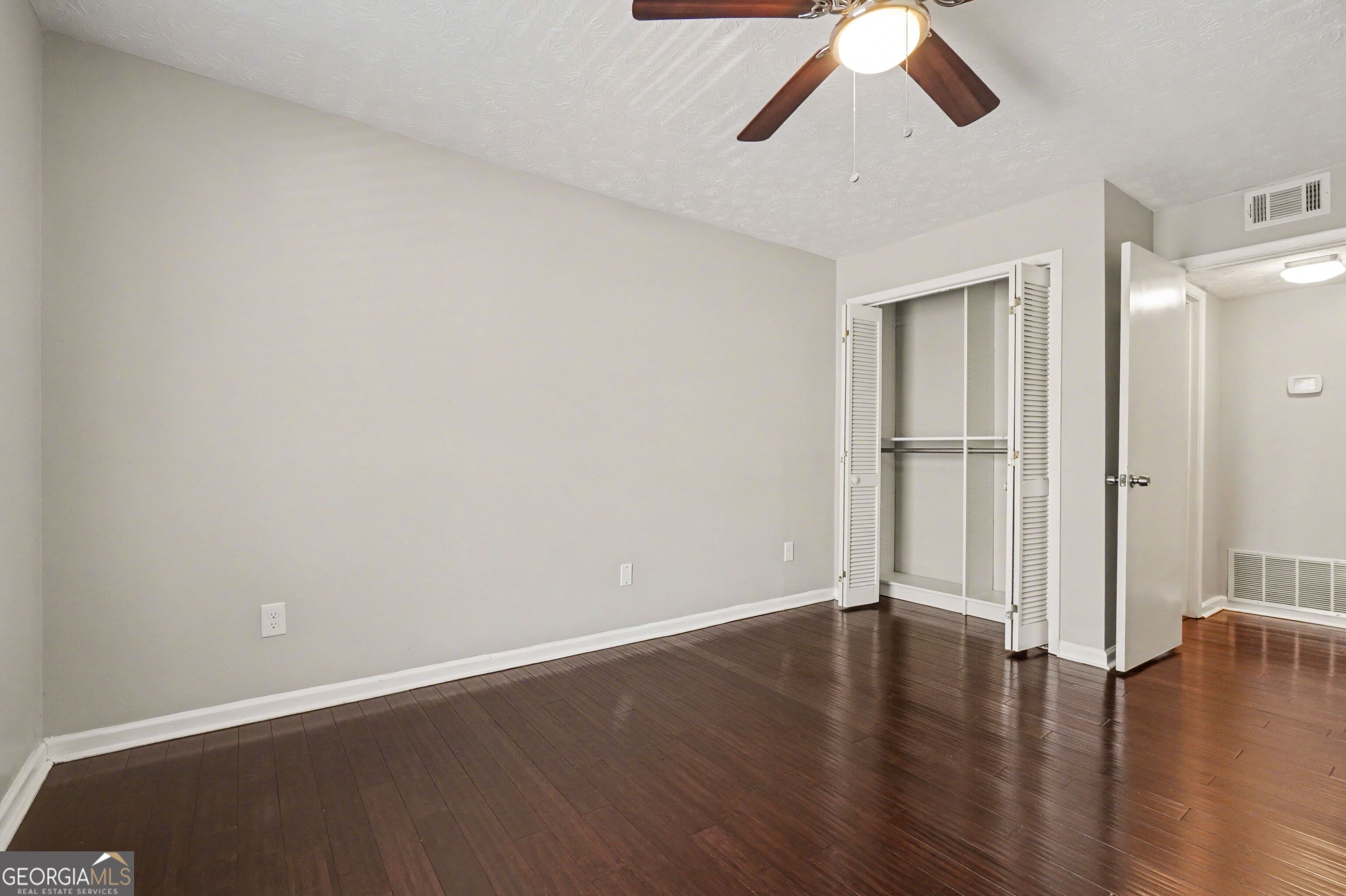 918 Dunbar Drive Atlanta, GA 30338 - Photo 11 of 16 wooden floor in an empty room
